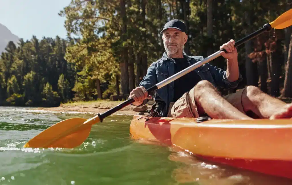 A person kayaking in nature