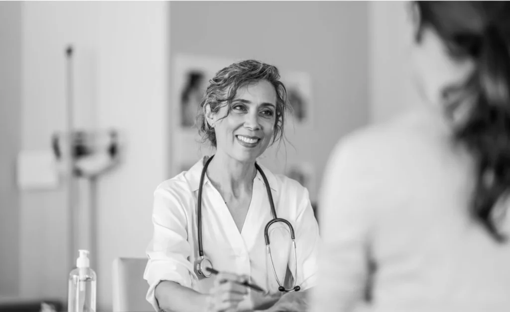 A doctor talks with a patient.