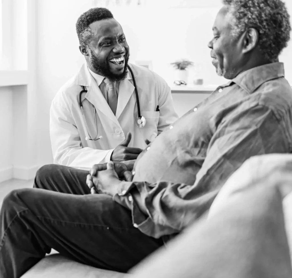 A doctor consults with his patient.