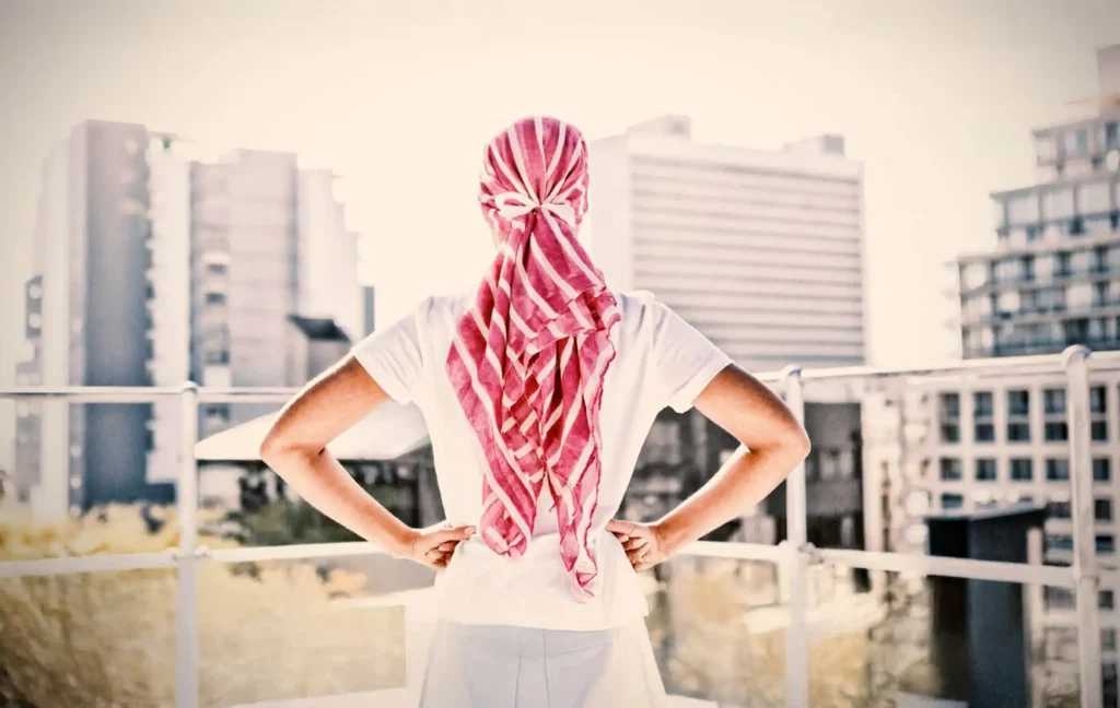 A cancer patient looks at a skyline.